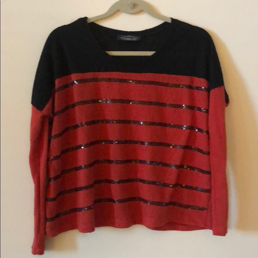 Orange and black sweater